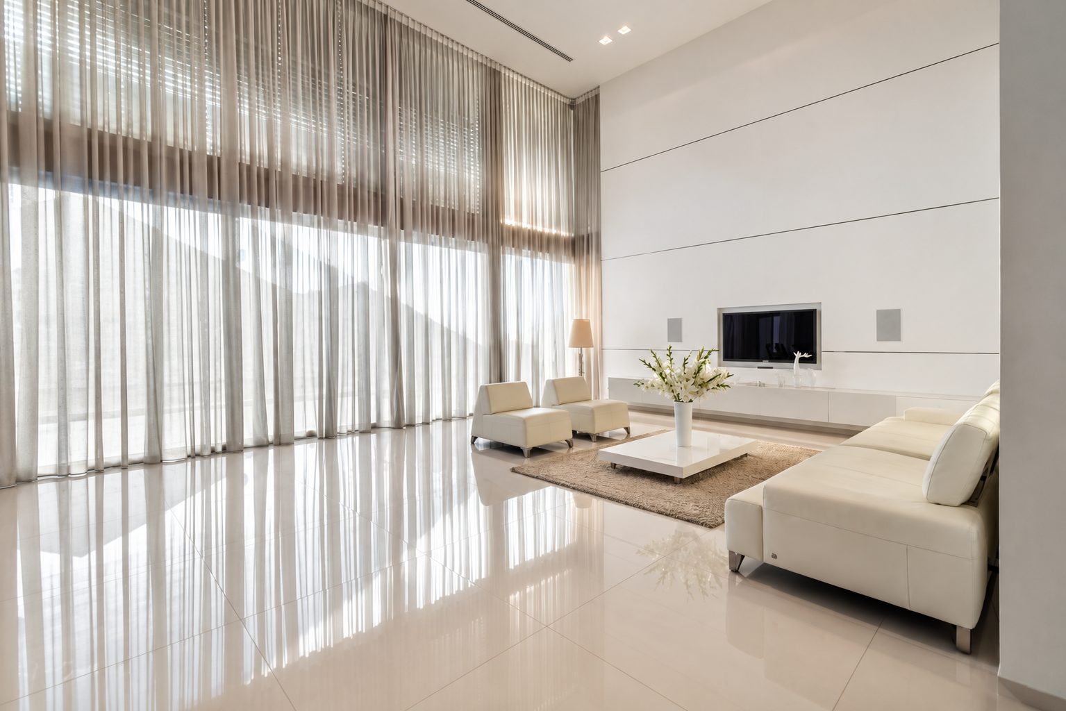 Living area with full height windows